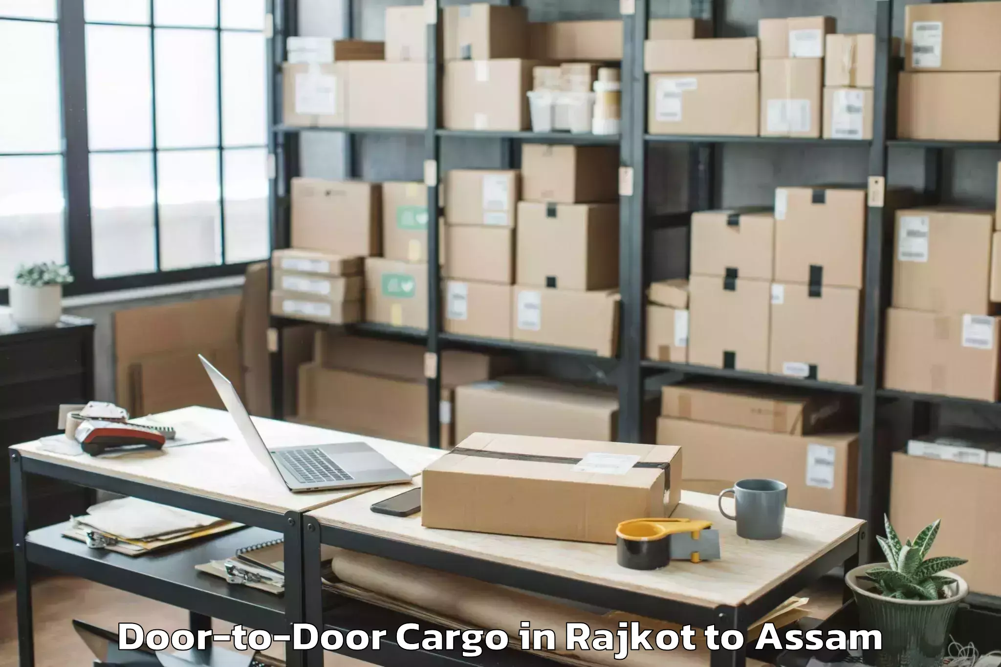 Easy Rajkot to Bhergaon Door To Door Cargo Booking